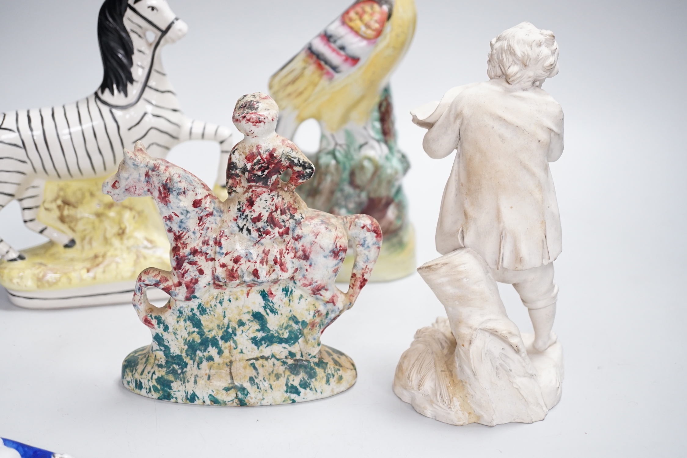 A Staffordshire spongeware rider on horseback, a Staffordshire pheasant, and three other items, pheasant 26cm